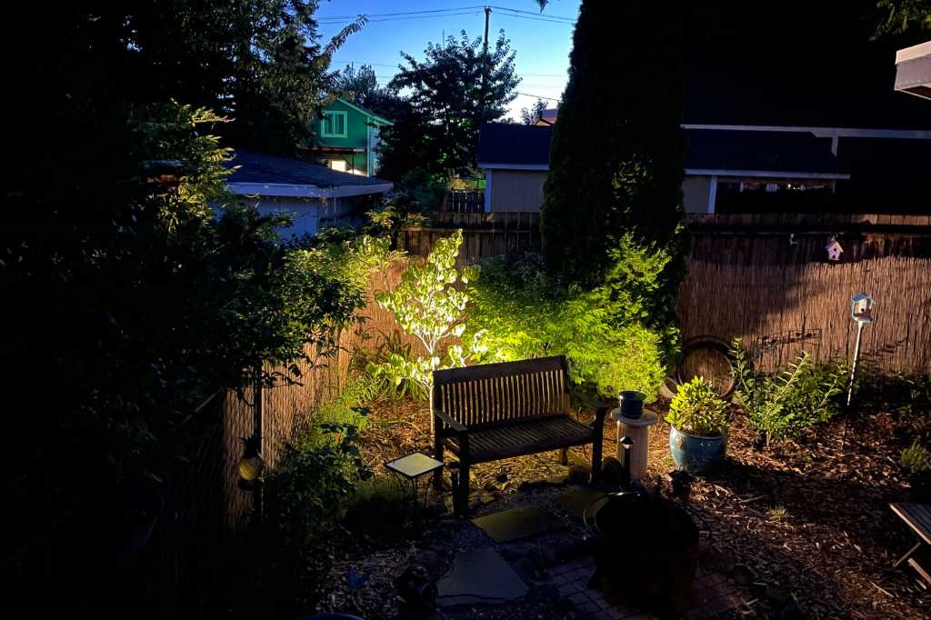 Yard lit by three Hampton Bay Hubspace Spotlights