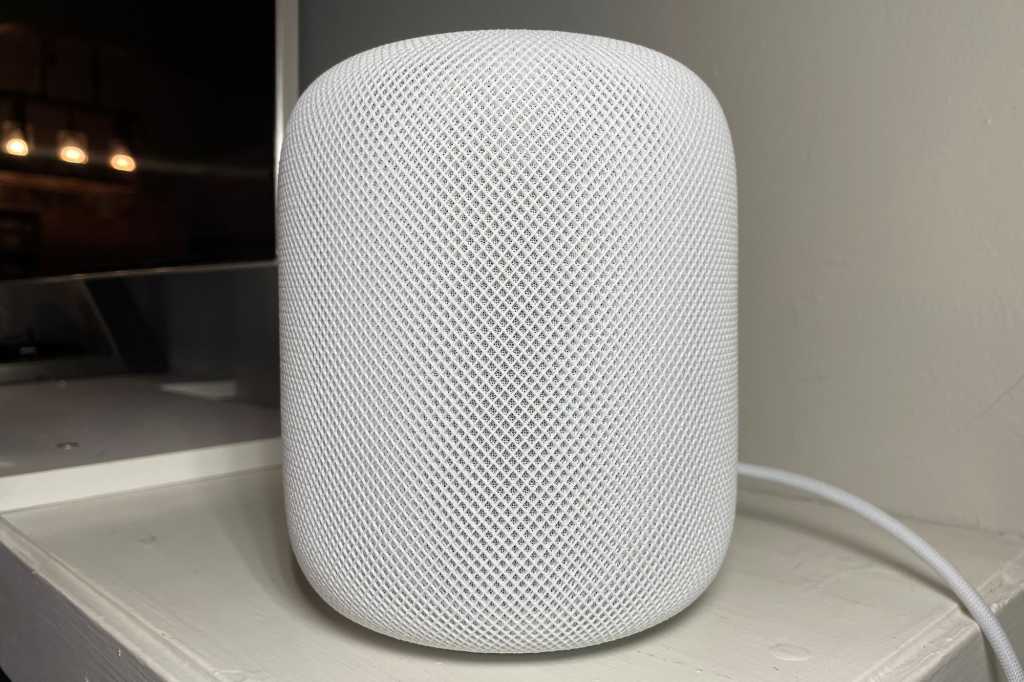 Apple HomePod (2nd Gen) next to a TV